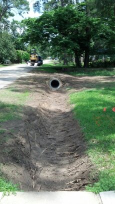 culvert installation and drainage ditch excavation