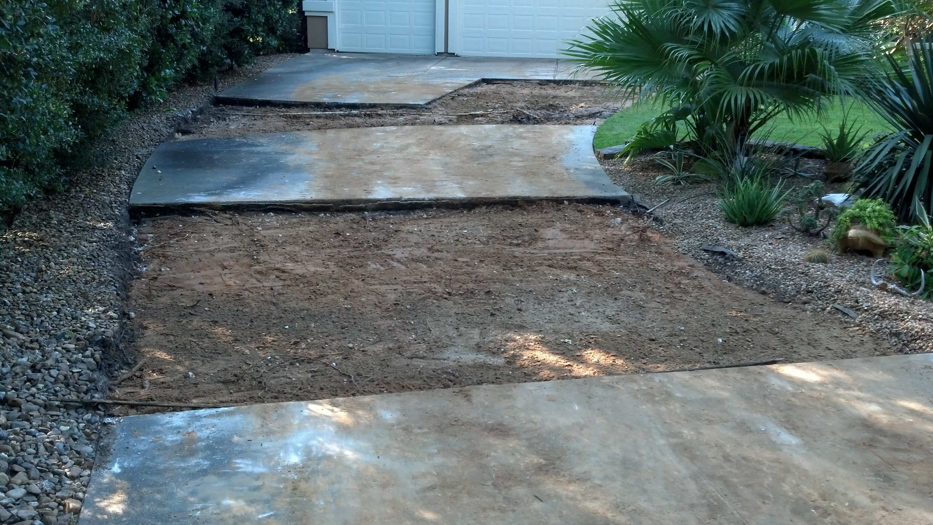 concrete driveway sections demoed