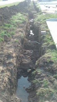 trenching that caved in due to heavy rain