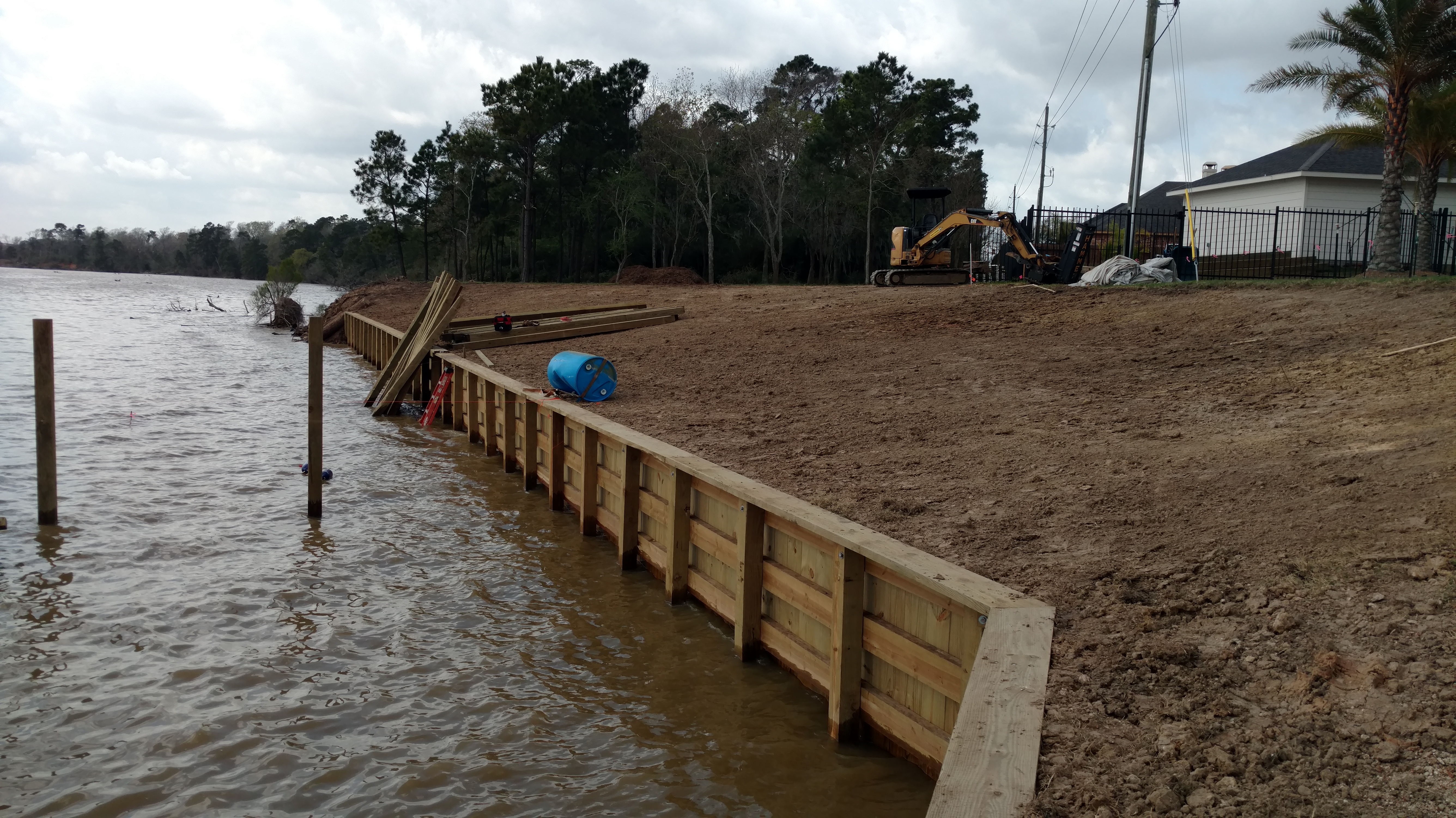 after back fill and final grade on new bulkhead construction at lake houston