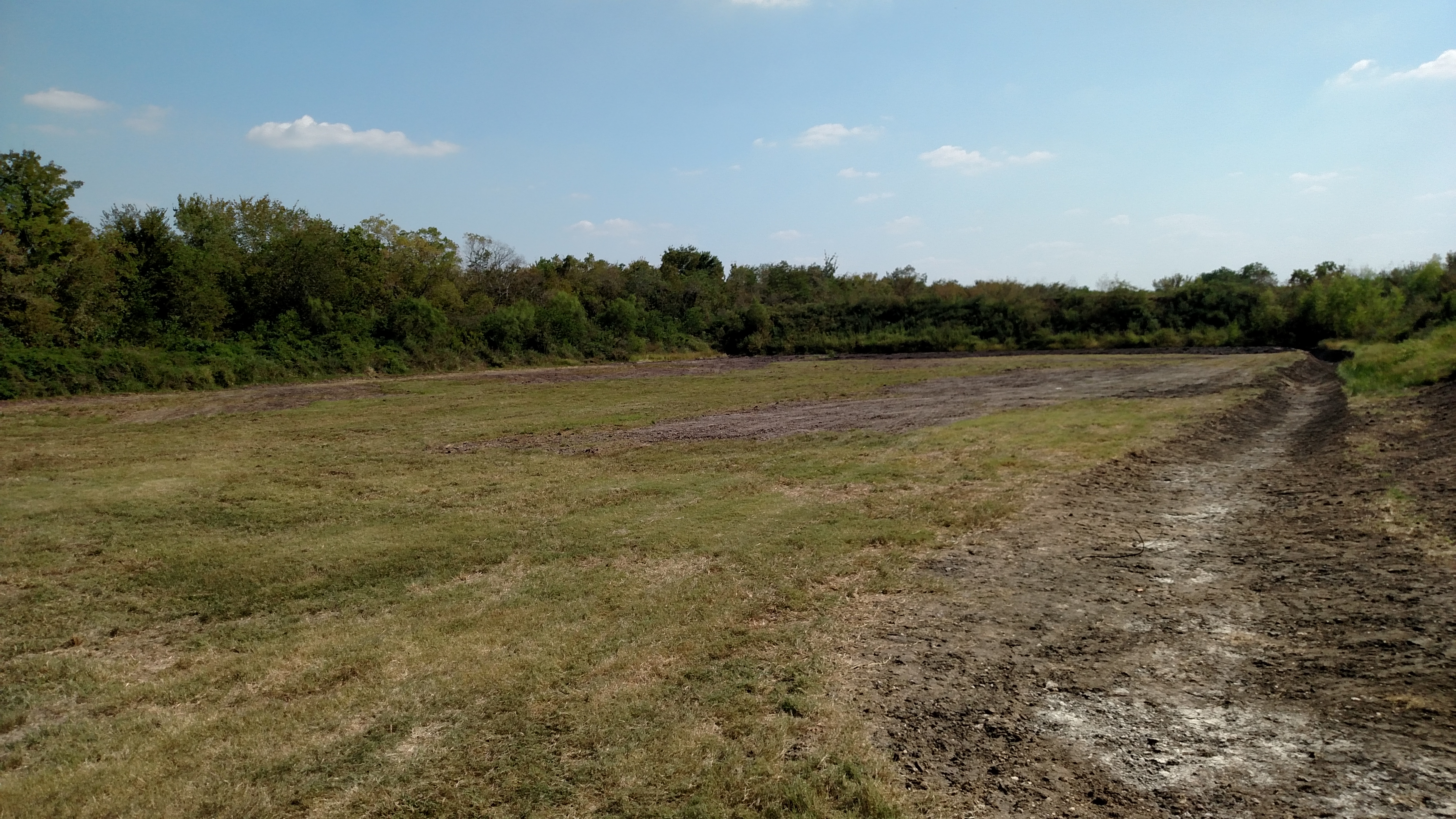 after grading and drainage ditch excavation on gun range